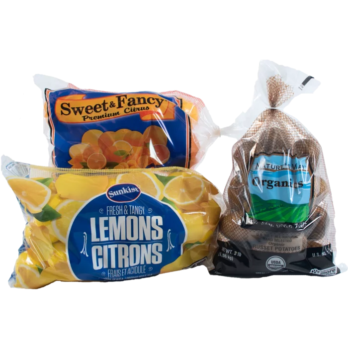 lemons, potatoes, oranges in mesh packaging
