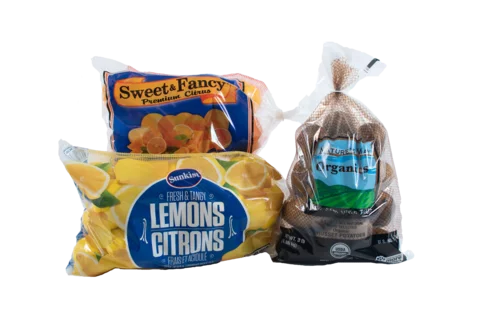 lemons, potatoes, oranges in mesh packaging
